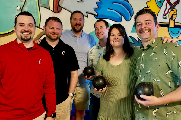 group of people enjoying bowling